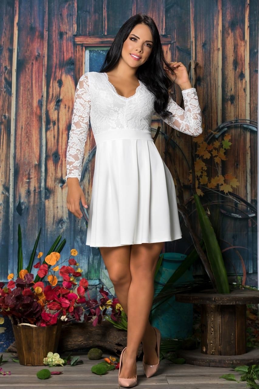 Style number: 8200
Price: $345
Product description: Multi-fabric, short, fit and flare dress with a lace bodice, v-neckline, long sleeves, solid pleated skirt, and back zipper for closure.
Fabric Contents: 90%POLYESTER 10%SPANDEX
Colors: white, royal blue, pink
Sizes: small, medium, large 
Quantity: 1 small, 1medium, 1 large for each color