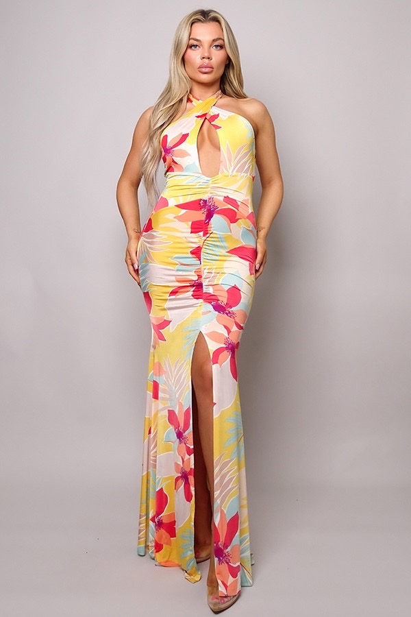 D11516-A
$350

Crossed front halter tropical floral maxi dress
Sleeveless
Double faced front top
Darted for a contoured bust
Front cutout detail
Wrap around waist with ruching
Center front ruching detail
High front slit
Button & loop closure at back neck
Golden button detail
Maxi length
Mermaid fit
Medium stretch for comfort

CONTENT & CARE:
92% polyester, 8% spandex